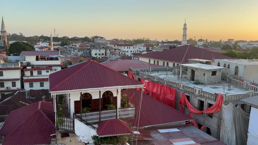 View of Stone town Mji Mkongwe Zanzibar city UNESCO world heritage sit tanzania town sunset skyline