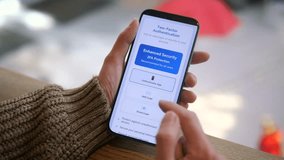 A user proactively strengthens her account security by activating two factor authentication through a mobile device. The video details the setup process from choosing the authentication method to - Powered by Shutterstock - Get 15% off with code: PIKWIZARD15