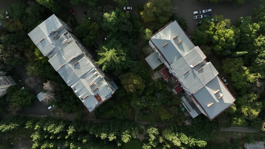 Wide shot of tilting up and showing the block of Vazha Pshavela avenue, Tbilisi, Georgia