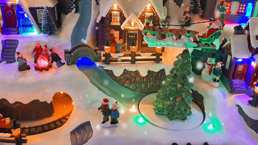 Tiny winter village for Christmas with festive lights and miniature toys