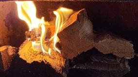 Burning Fireplace with Burned Logs, Embers and Sparks - Powered by Shutterstock - Get 15% off with code: PIKWIZARD15