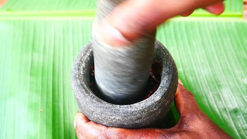 Grinding Chutney Stock Video, Grinding Chutney In Rock Pestel, Crushing Shallots and Chilly Footage, Free Cooking Video, Indian Cooking Video Clips