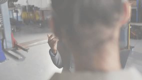 Technician clicking laptop and analyzing auto codes via transparent overlay for diagnostics. Technology, collaboration, innovation, automotive, data analysis, professional, industrial - Powered by Shutterstock - Get 15% off with code: PIKWIZARD15