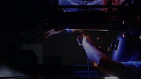 Welder igniting torch and cutting metal with animated gauges and charts updating for fabrication. Industrial, technology, innovation, manufacturing, engineering, precision, digital - Powered by Shutterstock - Get 15% off with code: PIKWIZARD15