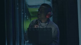 Cybersecurity engineer raising finger manipulating lock interface on server rack ensuring security. Technology, cybersecurity, digital, ui, interface, futuristic, engineering - Powered by Shutterstock - Get 15% off with code: PIKWIZARD15