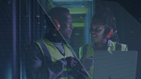 Plant techs tapping tablet and pointing laptop, initiating AR update for output stats. Industrial, collaboration, technology, digital, innovation, manufacturing, teamwork - Powered by Shutterstock - Get 15% off with code: PIKWIZARD15