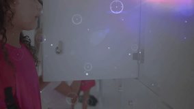 Girl in pink opening locker in school activating overlay, peers unlocking lockers grabbing items. Technology, youth, education, digital, connectivity, innovation, networking - Powered by Shutterstock - Get 15% off with code: PIKWIZARD15