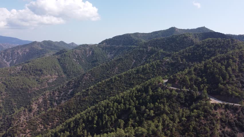 Panoramic aerial view of forested hills and valleys in the Troodos Mountains, Cyprus