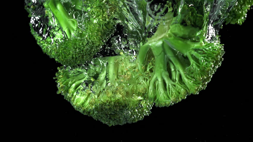 Broccoli fall underwater. Filmed on a high-speed camera at 1000 fps. High quality FullHD footage