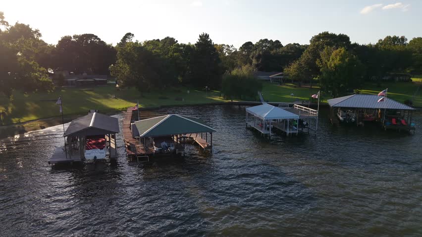 Sunset on a lake with boat docks