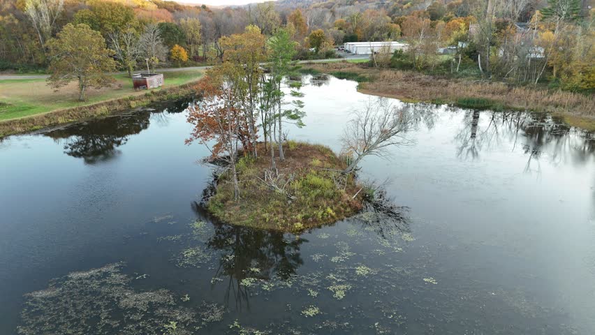 Southbury, Connecticut. 10-21-2025. Aerial view of a serene lake in Southbury, Connecticut, surrounded by lush trees and peaceful nature—ideal for themes of tranquility and outdoor beauty.
