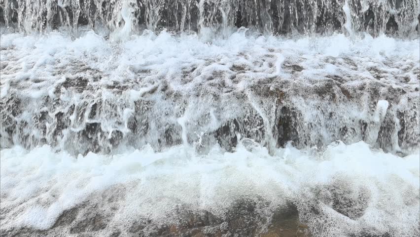 Water flows through a dam
