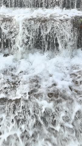 Water flows through a dam