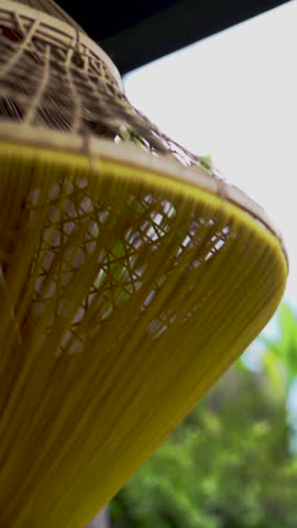 close up of aesthetic bamboo hanging lamp
