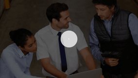 Warehouse team inputting data on laptop, generating connectivity icons and mapping IoT network. Collaboration, logistics, technology, connectivity, digital, enterprise, efficiency - Powered by Shutterstock - Get 15% off with code: PIKWIZARD15