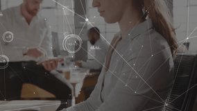 Woman pausing typing and turning toward camera as data overlay expanding to show business analytics. Professional, collaboration, technology, innovation, corporate, futuristic, workspace - Powered by Shutterstock - Get 15% off with code: PIKWIZARD15