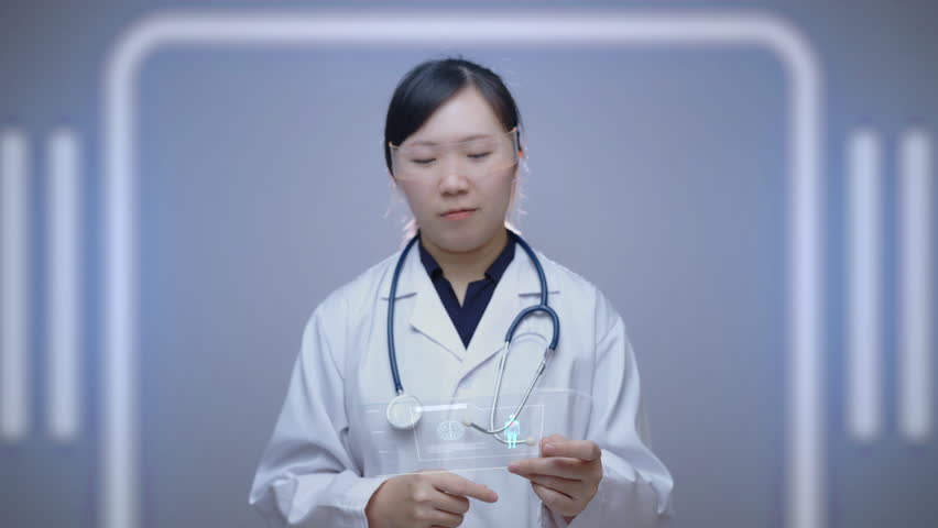 A female doctor uses a cutting-edge holographic interface to analyze medical data, including brain scans, DNA images and EKGs, demonstrating innovations in healthcare and medical technology. - Powered by Shutterstock - Get 15% off with code: PIKWIZARD15