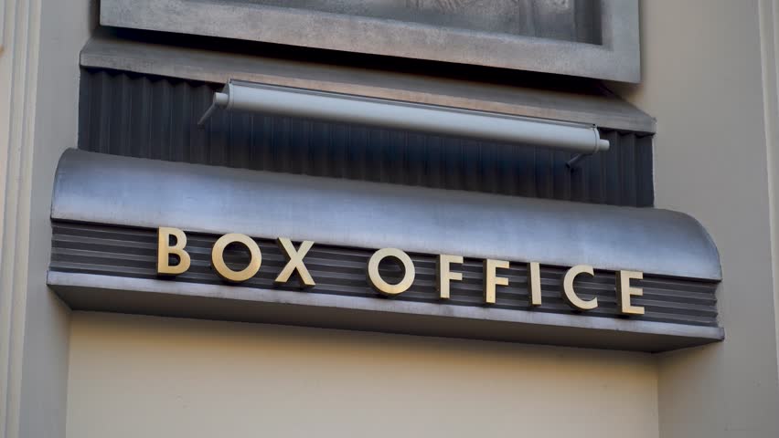 Box office sign on modern building facade