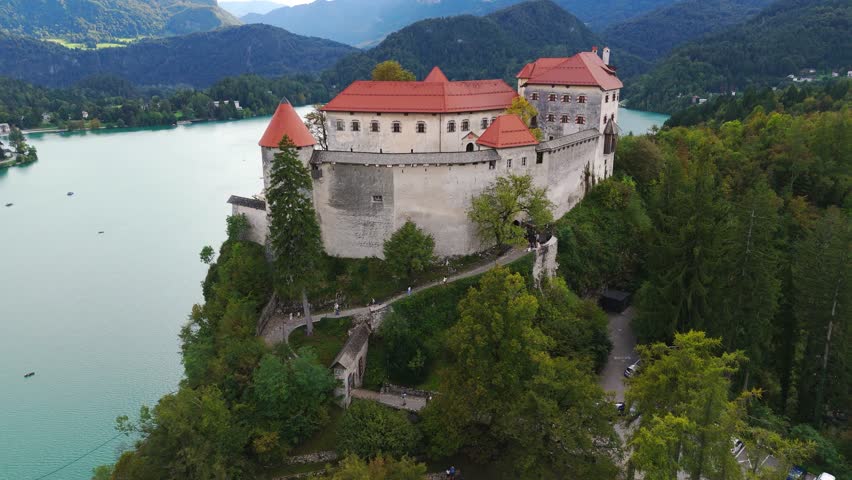 Aerial View Of Medieval Castle On Hill Overlooking Bled Lake in Slovenia, Bled Castle