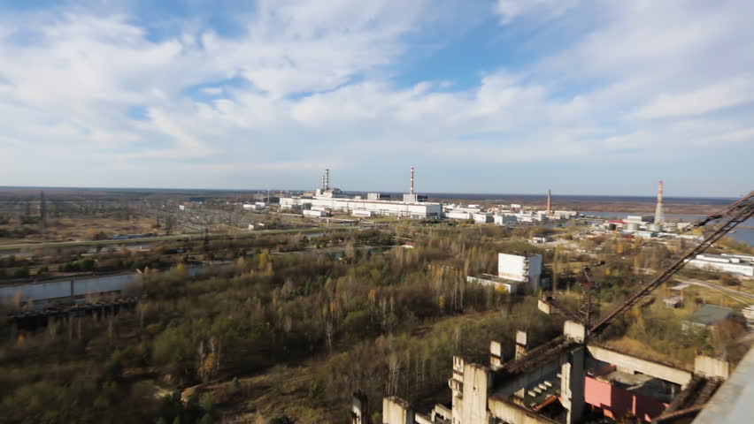 Industrial Complex With The New Safe Confinement Structure At Chernobyl Nuclear Power Plant In Ukraine. Aerial Zoom In Shot