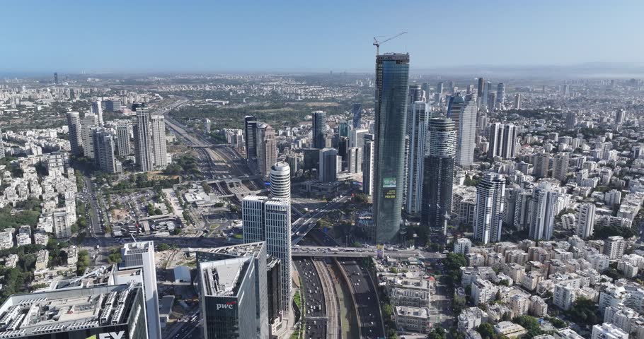 Ayalon Highway, Tel Aviv, Israel – 2025 – Aerial view of the main road leading into the city surrounded by skyscrapers and high-tech business district