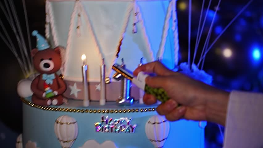 Birthday celebration with a big cake and candles