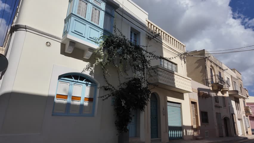 Malta Valletta residential building with beautiful facade architecture and blue balconies