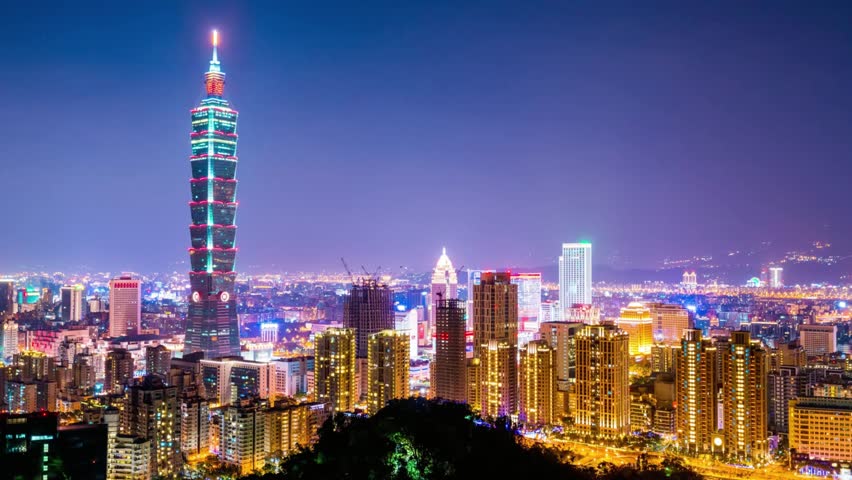 Taipei skyline at night showcasing the iconic Taipei 101 building and city lights