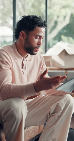 Moving, paperwork and man with stress on couch, overwhelmed or reading contract for title transfer. Real estate, frustrated person and review mortgage cost, worry and thinking finances for relocation