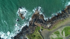 Drone aerial landscape of van vehicle parked on road in public carpark with ocean waves crashing on rocky coastline bay cove and headland at Crowdy Head NSW Australia travel tourism nature outdoors - Powered by Shutterstock - Get 15% off with code: PIKWIZARD15