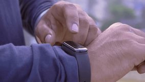 A person interacts with a smartwatch, tracking fitness activity, heart rate, and health metrics. This video highlights modern wearable technology, fitness tracking, and digital wellness for an active  - Powered by Shutterstock - Get 15% off with code: PIKWIZARD15