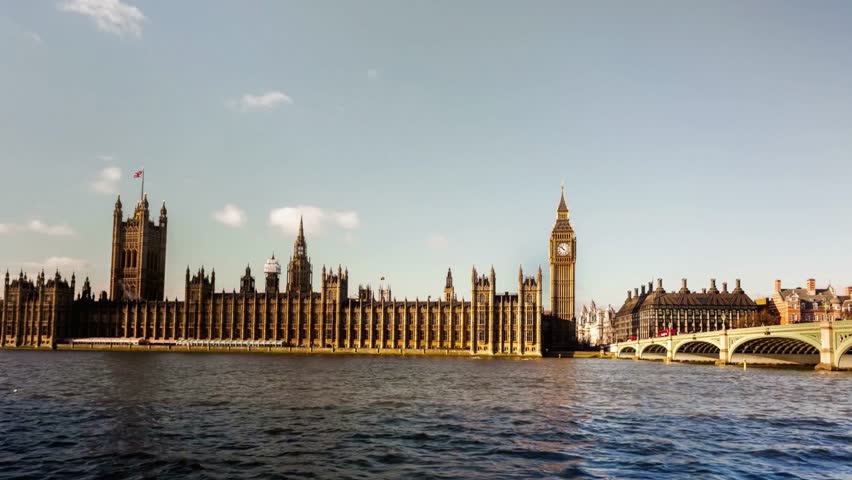 Houses of Parliament and Big Ben over the River Thames in London on a sunny day
