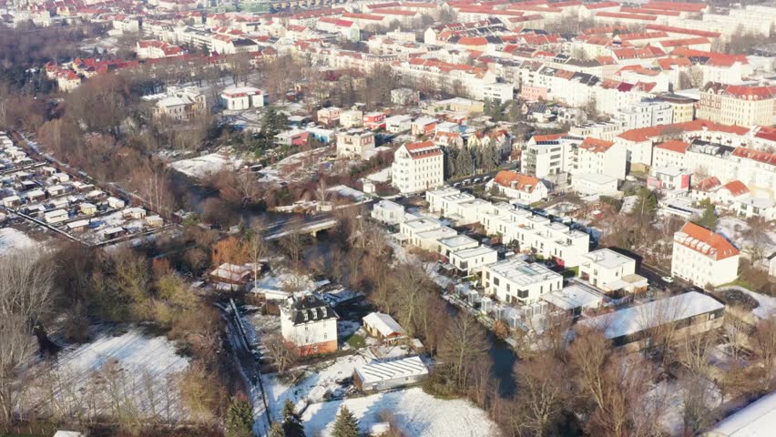 Aerial view of a city covered in snow on a bright winter day in europe germany