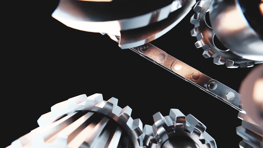 Metallic gears rotating smoothly, showcasing industrial mechanisms