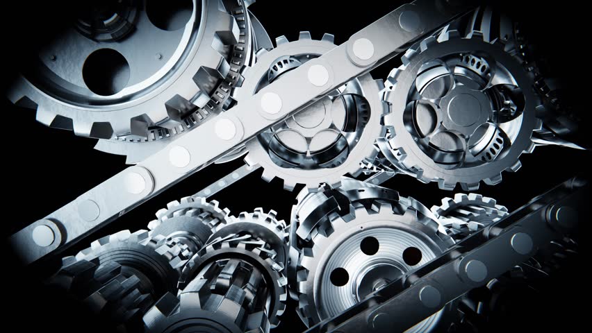 Metallic cogwheels and chain rotating, complex engine mechanism isolated on black background