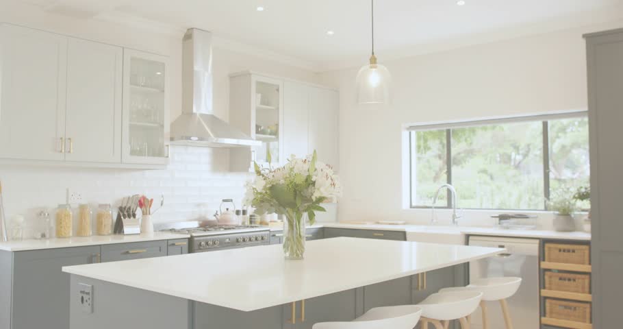 Particles appearing at top drifting across kitchen island visualizing festive ember effect. Modern, minimalism, interior, decor, ambient, shimmering, elegant