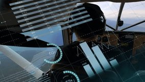 Pilot wearing cap and headset monitoring cockpit flight data overlays fading in and updating charts. Aviation, cockpit, analytics, navigation, technology, data visualization, altitude - Powered by Shutterstock - Get 15% off with code: PIKWIZARD15