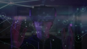 Woman wearing VR headset in lab watching malware network materializing and interacting with nodes. Technology, cybersecurity, digital, interface, innovation, futuristic, virtual - Powered by Shutterstock - Get 15% off with code: PIKWIZARD15