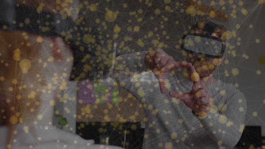 Senior male framing VR network nodes and summoning hack overlay showing intrusion in tech demo. Virtual reality, augmented reality, digital network, futuristic, cybersecurity, innovation, technology - Powered by Shutterstock - Get 15% off with code: PIKWIZARD15