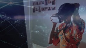woman adjusting VR headset then navigating virtual interface with technology graphics overlay. Futuristic, innovation, digital, immersive, technology, modern, creative - Powered by Shutterstock - Get 15% off with code: PIKWIZARD15