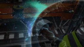 Engineer viewing emerging globe overlaying chest, tapping tablet for real-time industrial insights. Technology, innovation, digital, data visualization, industrial, manufacturing, futuristic - Powered by Shutterstock - Get 15% off with code: PIKWIZARD15