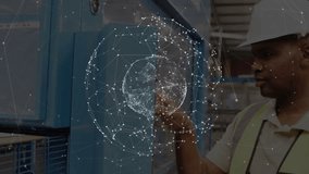 Operator rotating red knob and pressing button to start machine while network overlay pulsing. Industrial, technology, manufacturing, automation, machinery, digital, engineering - Powered by Shutterstock - Get 15% off with code: PIKWIZARD15