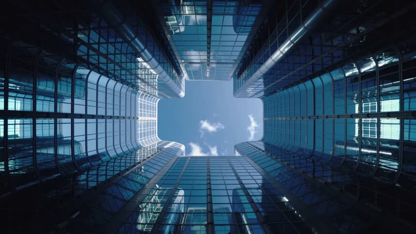 Worm's-eye view of four modern glass skyscrapers meeting at a central point, looking up into a bright blue sky, symbolizing corporate power, finance, and architecture