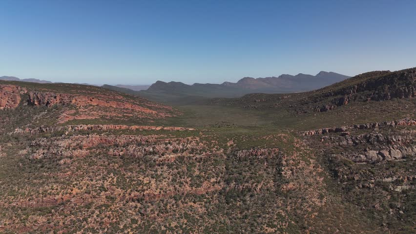 4K Aerial Footage of Flinders Ranges, South Australia – Majestic Outback Landscape of Red Rock Formations, Panoramic Mountain Ridges, Forest, Vast Plains in Australia Inland
