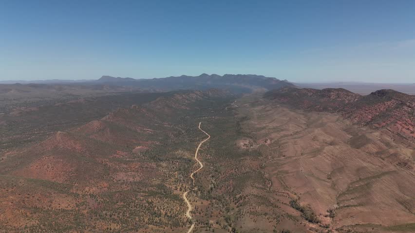 Brachina Gorge, South Australia – 4K Aerial Drone Footage of Geological Trail, Rugged Red Cliffs, Winding Dirt Road, Vast Valleys, Mountain Ridges, Rocky Terrain, Outback Landscape in Flinders Ranges