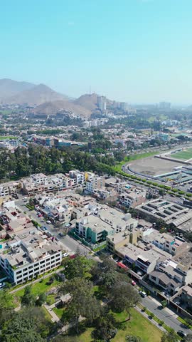 Panoramic aerial view of the vast residential and urban district of La Molina, Lima, Peru.