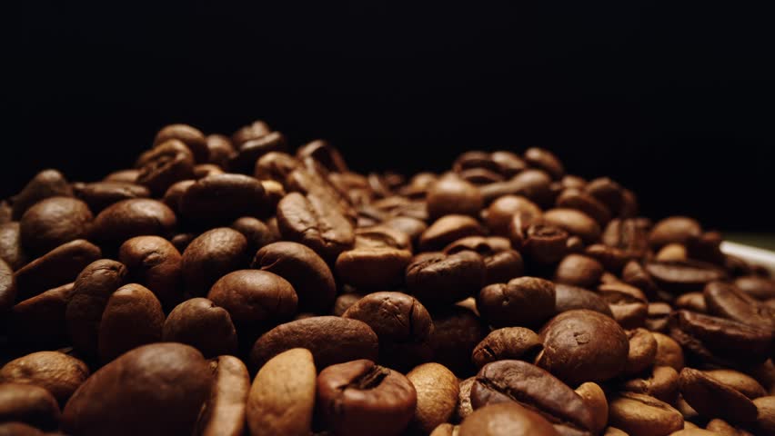 Coffee beans and latte art close-up