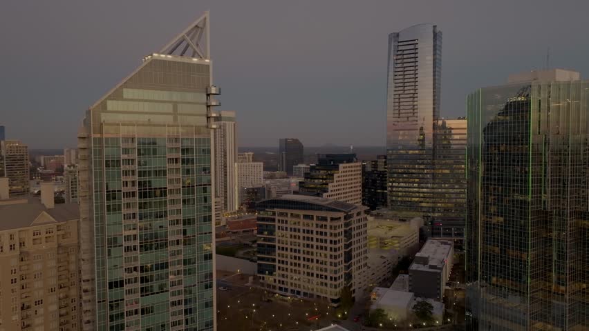 Buckhead business district, luxury skyline apartment and condo buildings at sunset, Sovereign skyscraper in view, Atlanta, Georgia