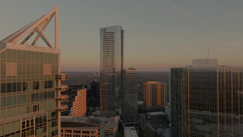 Buckhead district luxury skyline apartment at sunset, Sovereign skyscraper in view, Atlanta, Georgia