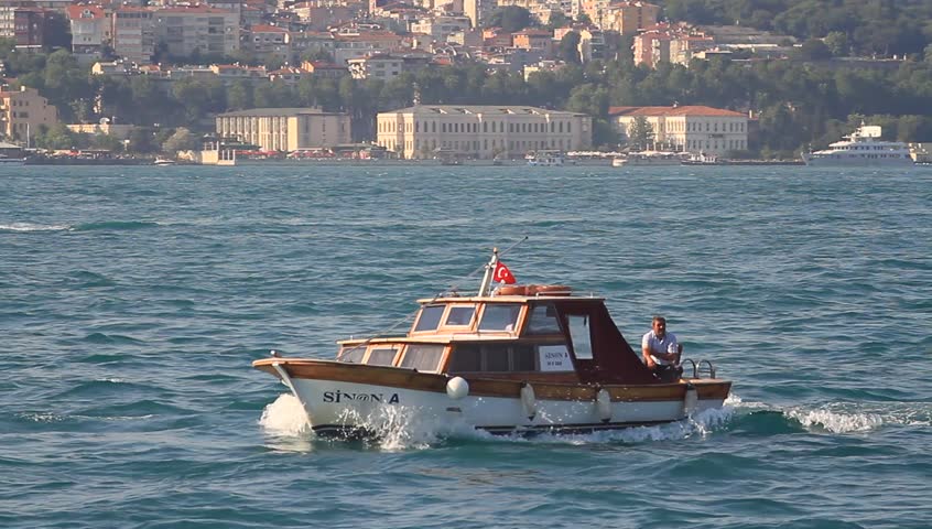 ISTANBUL - JUNE 2: Wooden boat sails along the Bosporus Sea on June 2, 2012 in